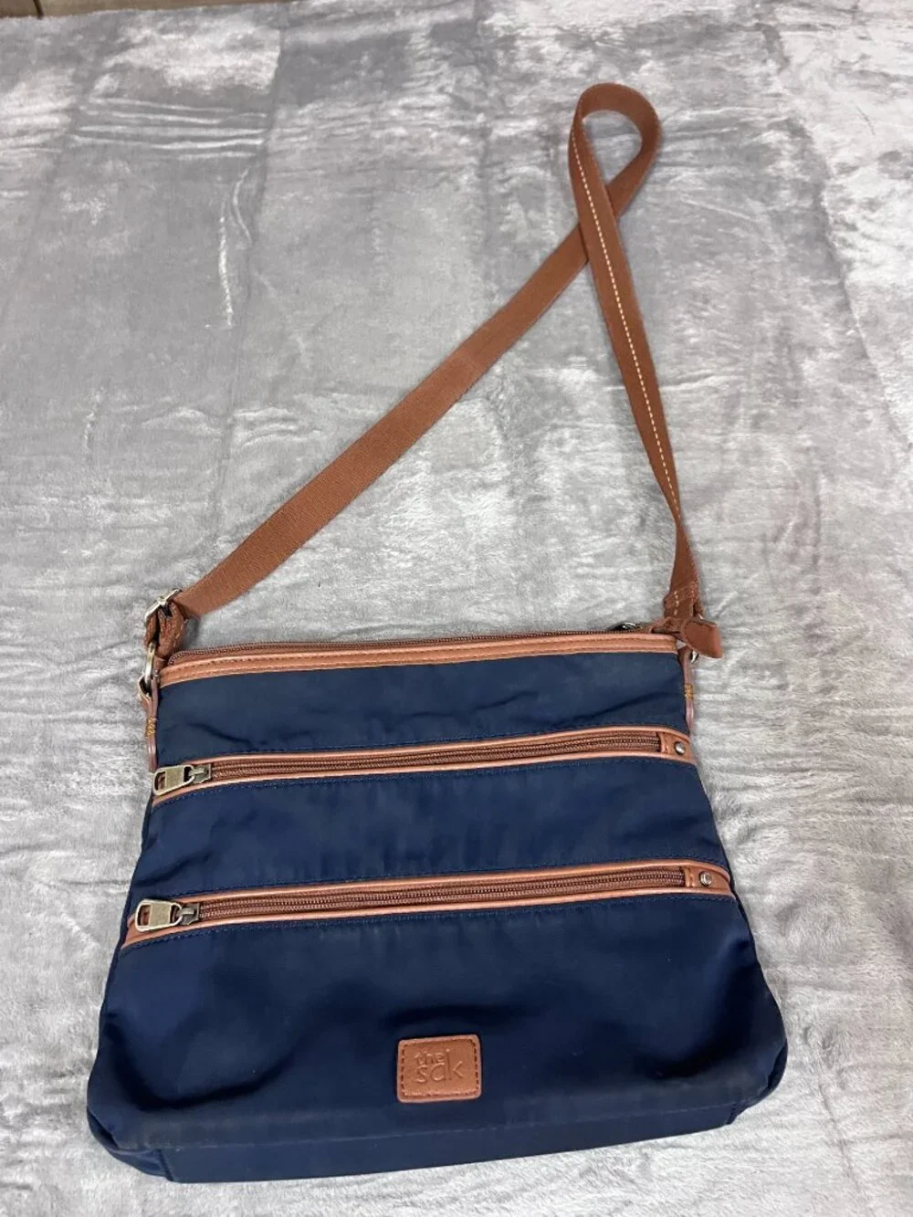 The Sak Navy Nylon Crossbody Bag with Brown Accents